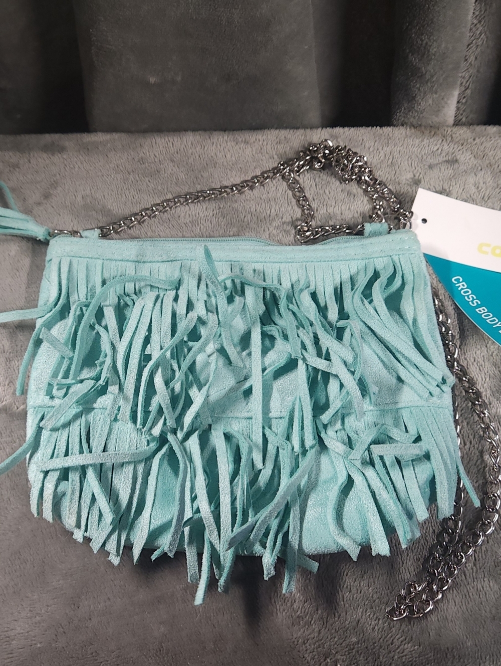 Capelli of New York Vibrant Turqoise Fringe Crossbody Bag